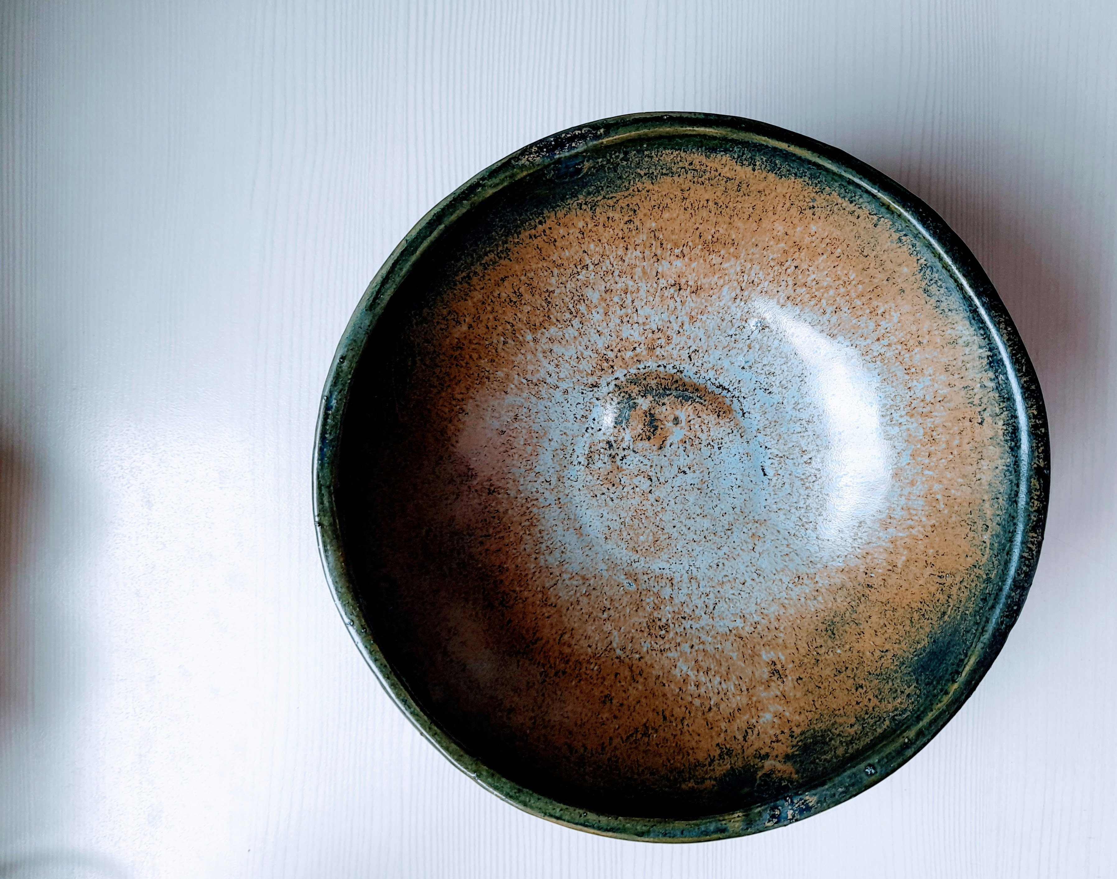 Ceramic frying pan on stove